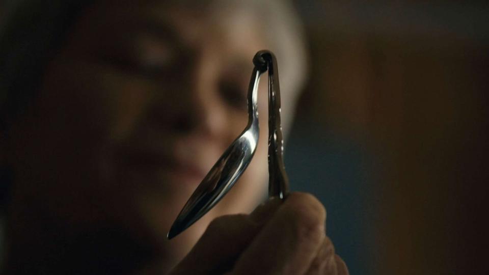 PHOTO: Jeannie Lagle, a psychologist who spent time researching Boyer and befriended her, is shown holding a bent spoon. (ABC News Studios)