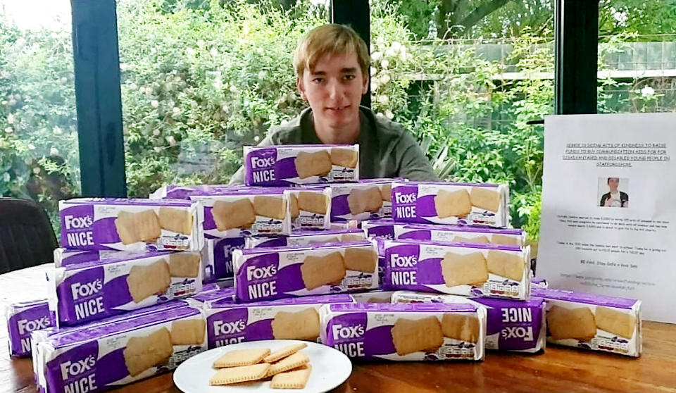 The teenager gave out 200 packets of NICE biscuits to random strangers, each with a 'Have a NICE Day' sticker attached. (Supplied Ashley Hall/SWNS)