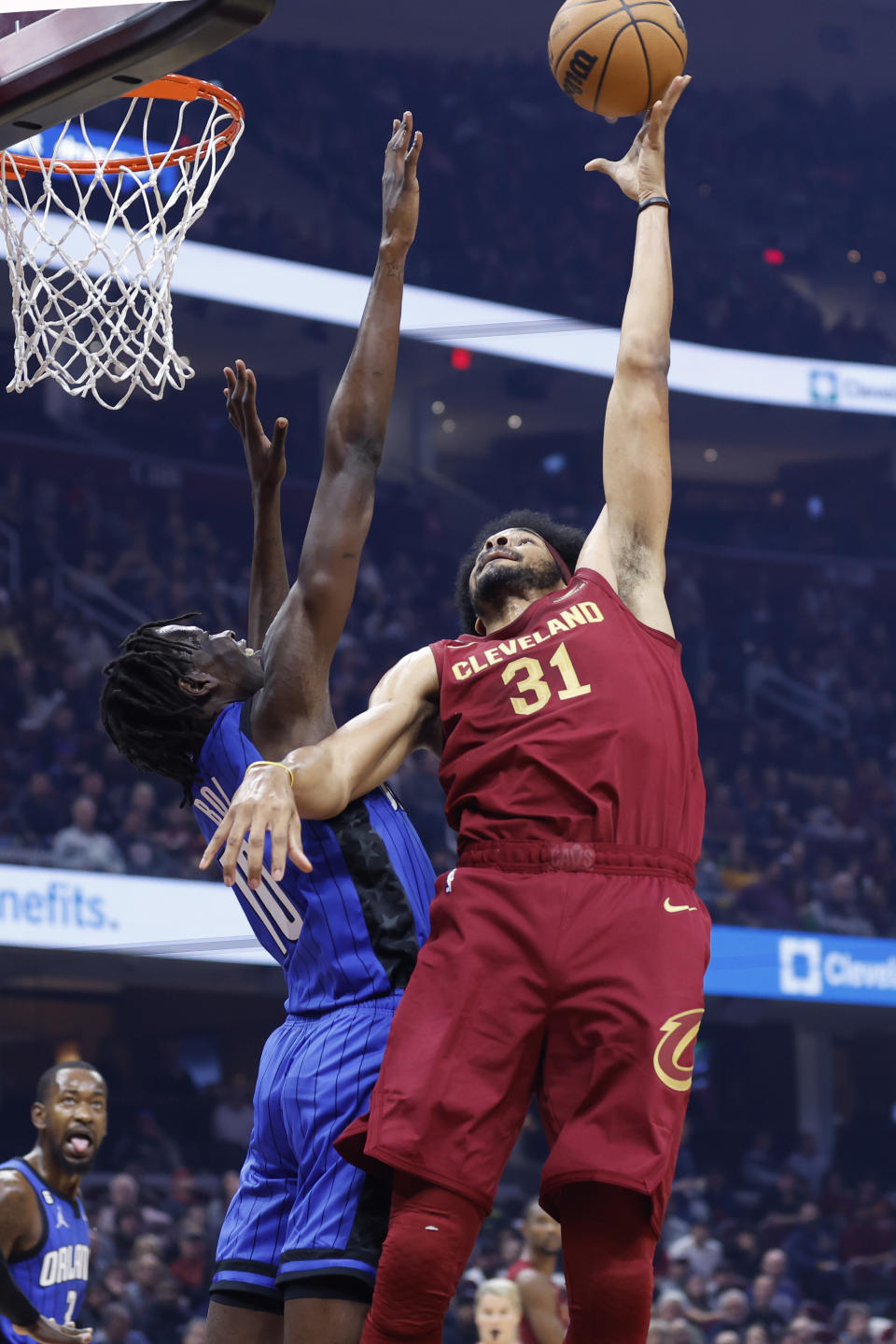 Cleveland Cavaliers center Jarrett Allen (31) shoots against Orlando Magic center Bol Bol (10) during the first half of a NBA basketball game, Wednesday, Oct. 26, 2022, in Cleveland. (AP Photo/Ron Schwane)