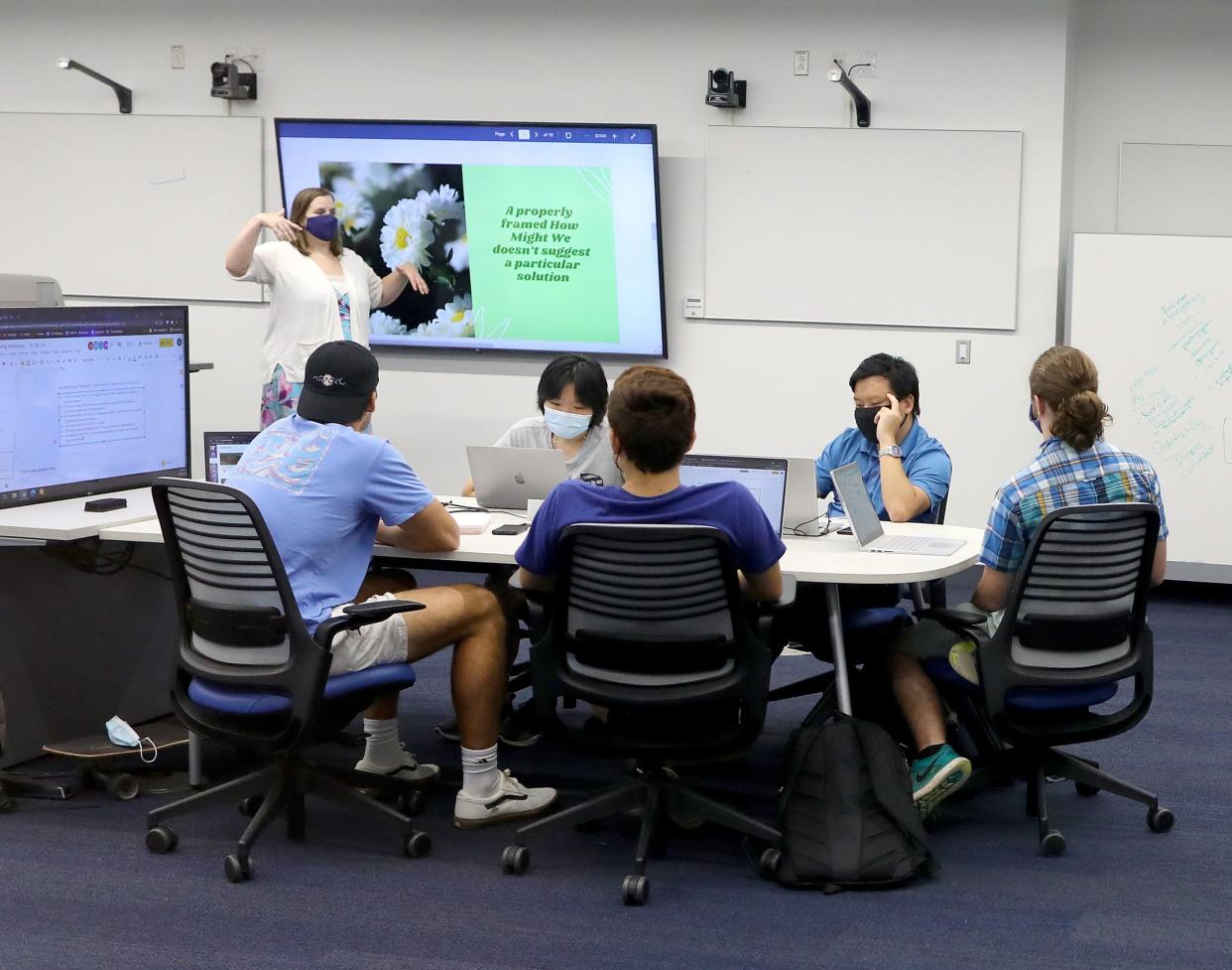 Students are seen in class during the dedication ceremony of new Herbert Wertheim Laboratory for Engineering Excellence building and labs at the University of Florida in Gainesville on Oct. 7.