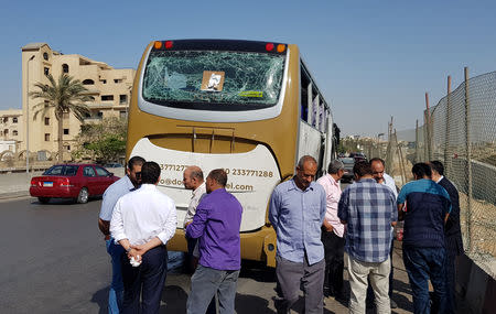 A damaged bus is seen at the site of a blast near a new museum being built close to the Giza pyramids in Cairo, Egypt May 19, 2019. REUTERS/Ahmed Fahmy