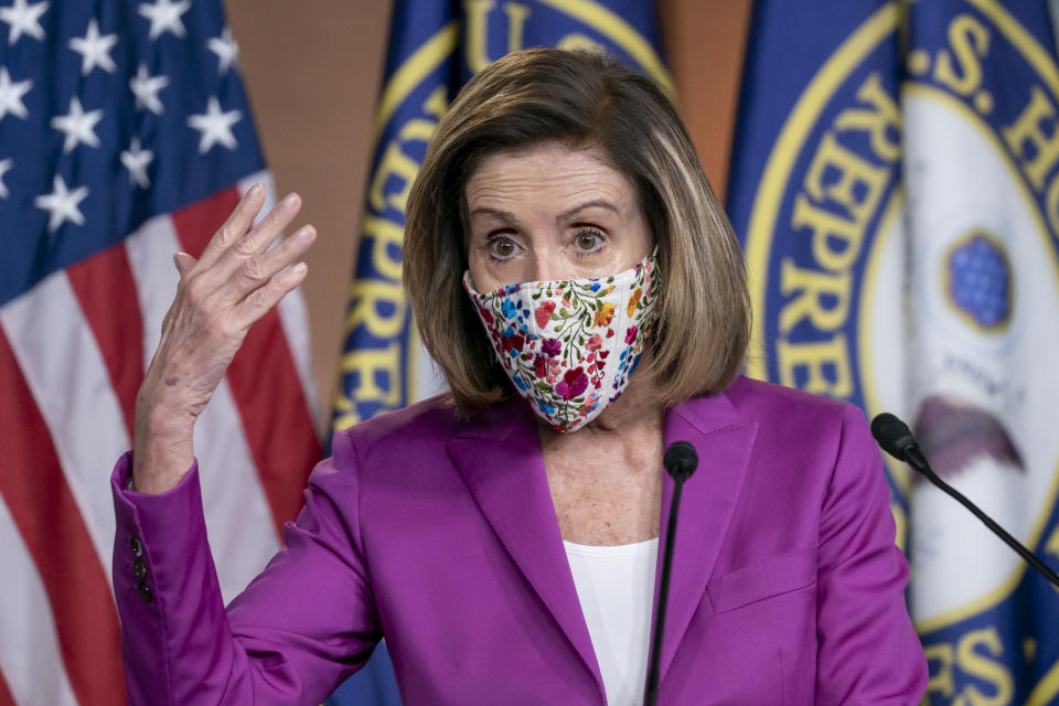 Speaker of the House Nancy Pelosi, D-Calif., holds a news conference on the day after violent protesters loyal to President Donald Trump stormed the U.S. Congress, at the Capitol in Washington, Thursday, Jan. 7, 2021. (AP Photo/J. Scott Applewhite)