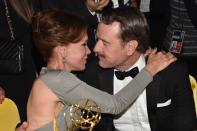 <p>Actors Bryan Cranston and Robin Dearden share a kiss at the Emmy Awards held at the Los Angeles Convention Center. Cranston starred on the hit AMC series <em>Breaking Bad</em> for five seasons.</p>