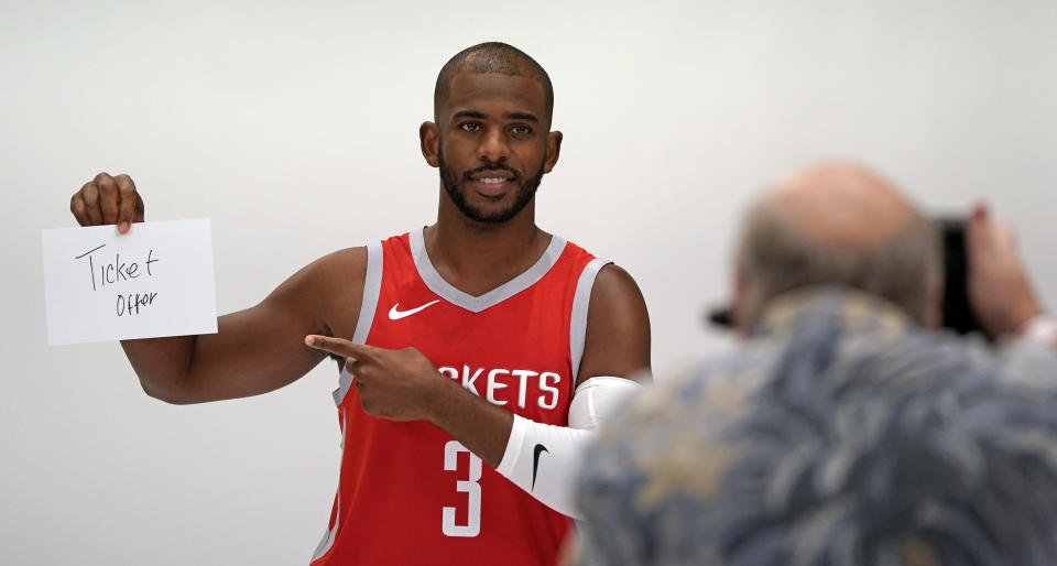 Houston Rockets' Chris Paul (3) poses for a photographer during media day Monday, Sept. 24, 2018, in Houston. (AP Photo/David J. Phillip)