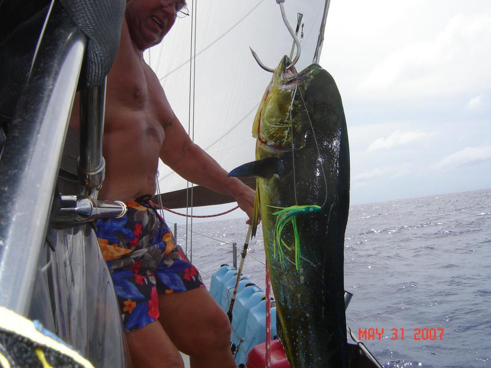 Kent Trompeter poses near a mahi mahi he caught in 2007 near the coast of St. Vincent in the Caribbean. He and his wife spent 10 years sailing around the area after he had retired from a private consulting business. He recently took on a new career as a high school teacher after finishing a four-year degree at Northern Colorado University at the age of 78.