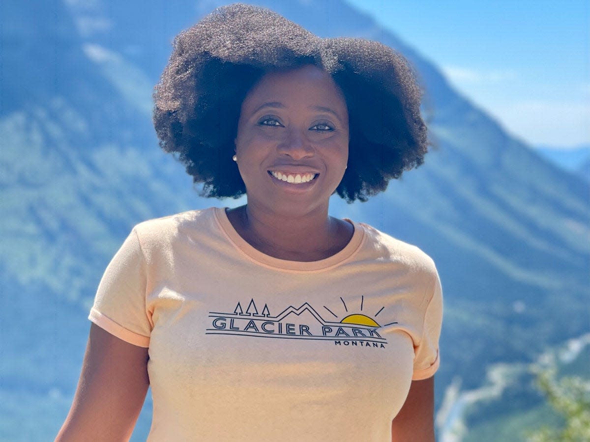 Ashley Nealy smiling in glacier national park
