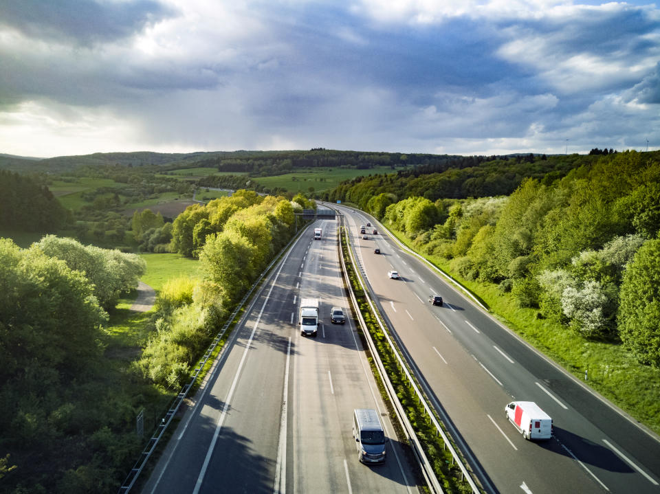 Highway in Germany with cars and sky with big clouds