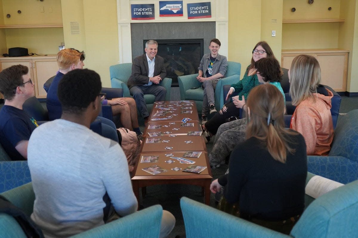 Students at the University of North Carolina Wilmington sit with 2024 governor candidate Josh Stein