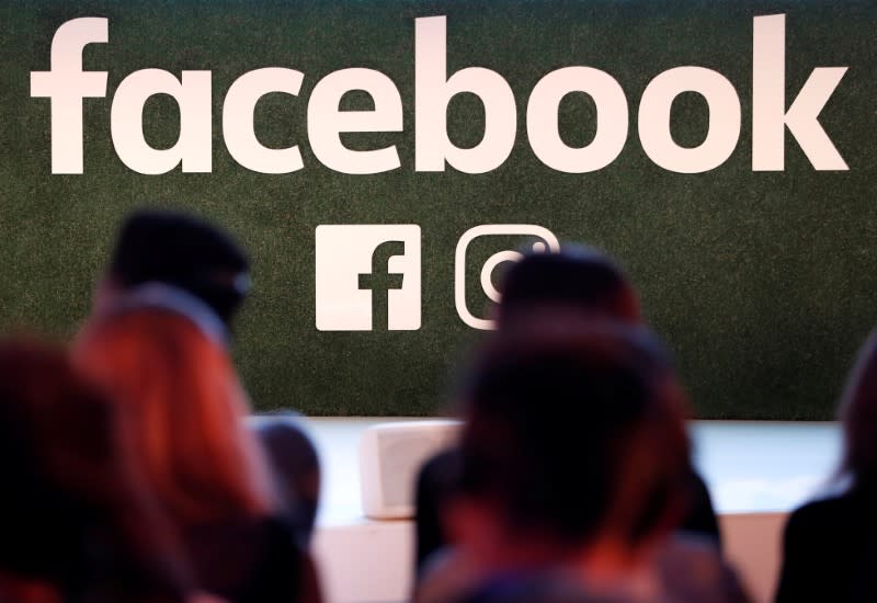 FILE PHOTO: A Facebook logo is seen at the Facebook Gather conference in Brussels, Belgium January 23, 2018. REUTERS/Yves Herman/File Photo