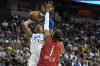 Orlando Magic's Paolo Banchero shoots over Houston Rockets' Jabari Smith Jr. during the first half an NBA summer league basketball game Thursday, July 7, 2022, in Las Vegas. (AP Photo/John Locher)