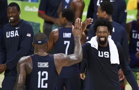 2016 Rio Olympics - Basketball - Final - Men's Gold Medal Game Serbia v USA - Carioca Arena 1 - Rio de Janeiro, Brazil - 21/8/2016. Deandre Jordan (USA) of the USA and Demarcus Cousins (USA) of the USA celebrate. REUTERS/Dylan Martinez