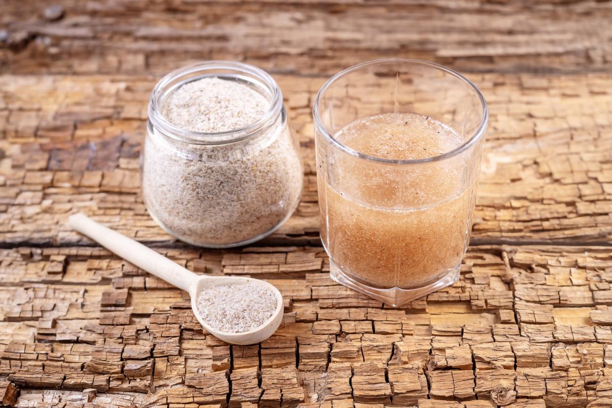 Psyllium husk on a table in a glass of water
