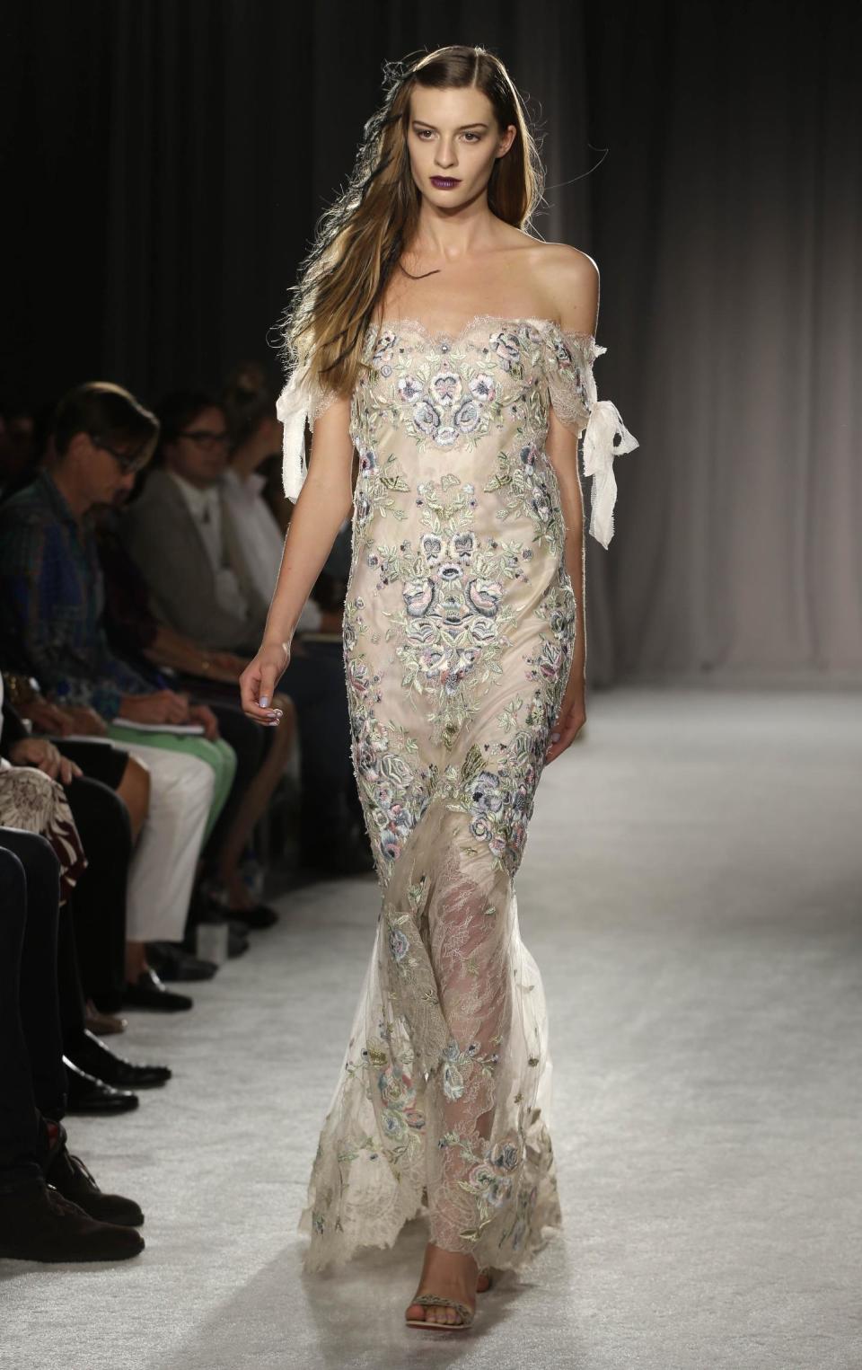 The Marchesa Spring 2014 collection is modeled during Fashion Week in New York, Wednesday, Sept. 11, 2013. (AP Photo/Seth Wenig)