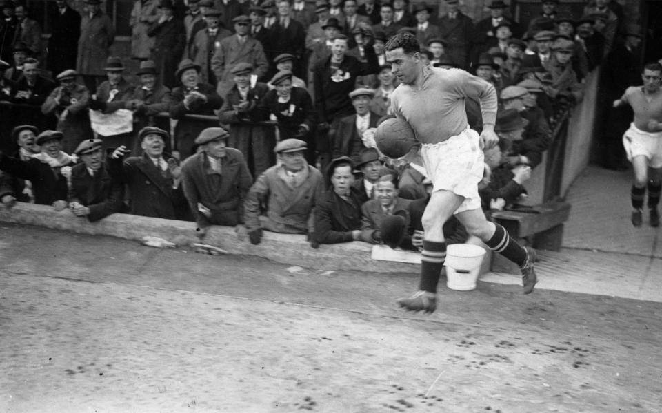 Everton team captain Dixie Dean (1907 - leads his side out onto the pitch as Everton play West Ham United - Getty Images/A.Hudson