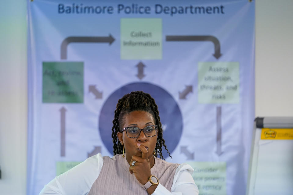 Baltimore Police Department Lt. Lakishia Tucker leads a professional development class with members of the police department, Thursday, Sept. 28, 2023, in Baltimore. As law enforcement agencies across the country pursue reform measures, the Baltimore Police Department is requiring its members to complete a program on emotional regulation that teaches them the basics of brain science by examining the relationship between thoughts, feelings and actions. (AP Photo/Julio Cortez)