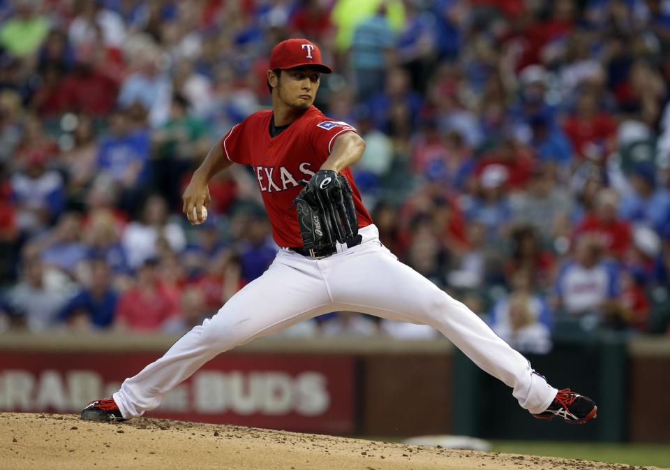 Texas Rangers' Yu Darvish of Japan works against the Boston Red Sox in the third inning of a baseball game, Friday, May 9, 2014, in Arlington, Texas. (AP Photo/Tony Gutierrez)