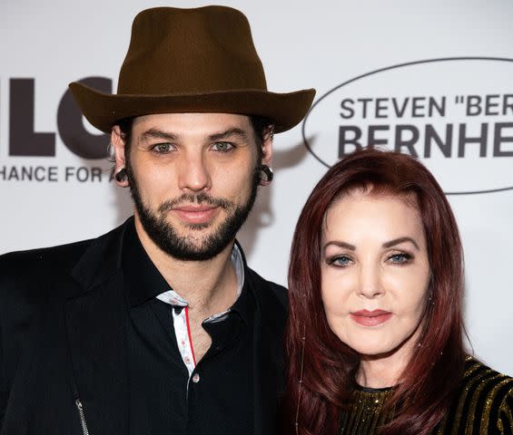 <p>Amanda Edwards/Getty</p> Navarone Garibaldi Garcia and Priscilla Presley