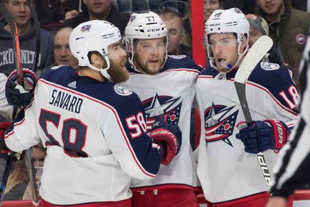 Feb 22, 2019; Ottawa, Ontario, CAN; The Columbus Blue Jackets celebrate a goal scored by right wing Josh Anderson (77) in the first period against the Ottawa Senators at the Canadian Tire Centre. Mandatory Credit: Marc DesRosiers-USA TODAY Sports