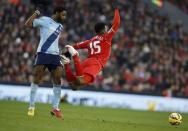 Liverpool's Daniel Sturridge falls after a foul by West Ham United's Alex Song (L) during their English Premier League soccer match at Anfield in Liverpool, northern England January 31, 2015. REUTERS/Phil Noble