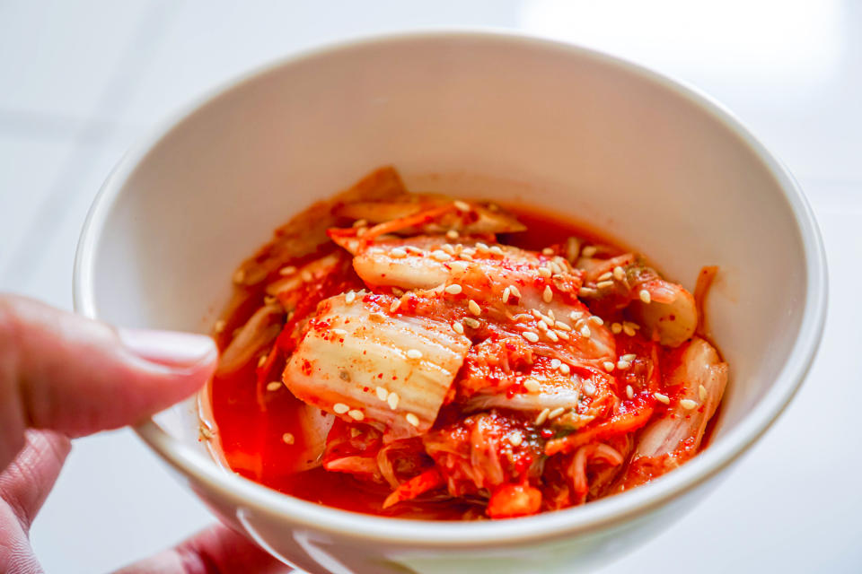 Kimchi is a traditional Korean dish whose components can vary but usually include some combination of vegetables, garlic, ginger, chili peppers, salt, and fish sauce. Salah satu jenis kimchi yang paling sering ditemui adalah kimchi cabbage. For the main flavour, kimchi is usually spicy, umami and sour.