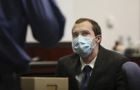 FILE - Mark Gooch awaits opening statements in his trial at the Coconino County Superior Court in Flagstaff, Ariz., on Friday, Sept. 24, 2021. Gooch, who was convicted of killing a Mennonite woman after kidnapping her in New Mexico and taking her to Arizona, will be sentenced next month. (Jake Bacon/Arizona Daily Sun via AP, File)