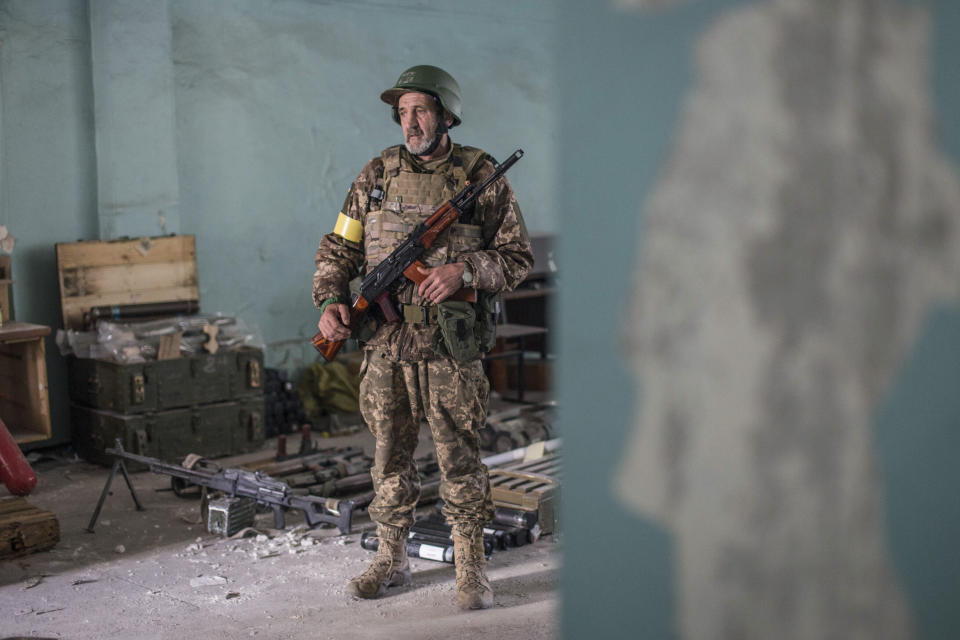 A Ukrainian soldier on a position during heavy fighting in the front line in Severodonetsk, Luhansk region, Ukraine, Wednesday, June 8, 2022. (AP Photo/Oleksandr Ratushniak)