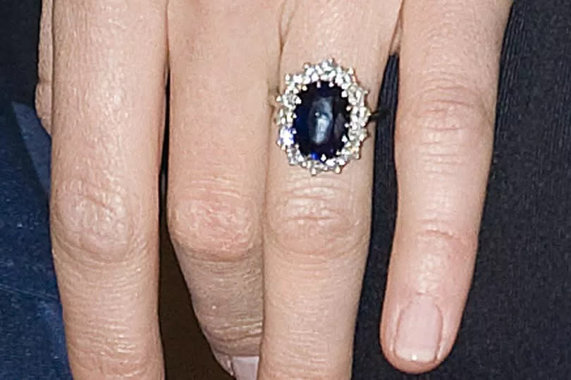 Kate Middleton's engagement ring, which once belonged to the late Princess Diana, is seen on Kate Middleton's finger as Prince William and Kate Middleton officially announced their engagement at St James's Palace on November 16, 2010 in London, England.