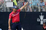 Louis Oosthuizen, of South Africa, reacts to making his eagle putt on the 18th green during the third round of the U.S. Open Golf Championship, Saturday, June 19, 2021, at Torrey Pines Golf Course in San Diego. (AP Photo/Marcio Jose Sanchez)