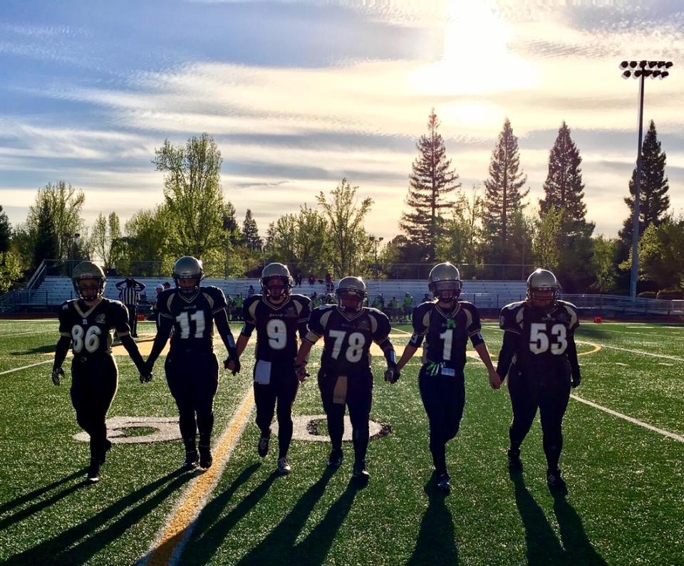 Female tackle football players shell out a couple thousand dollars per year, risk injury and sacrifice time with their families to play the sport they love. (Photo courtesy of Kaitlan Reiff)