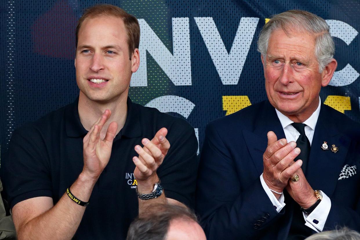 Prince William, Duke of Cambridge and Prince Charles, Prince of Wales watch the athletics during the Invictus Games at the Lee Valley Athletics Centre on September 11, 2014 in London, England.