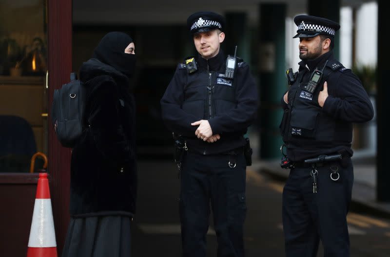 Police officers are seen outside the London Central Mosque in London