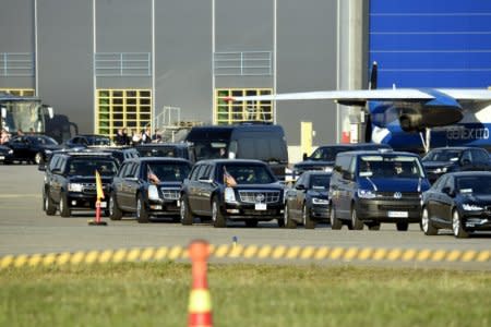 The motorcade waits for the arrival of U.S. President Donald Trump on the tarmac of the Helsinki International Airport in Vantaa, Finland, July 15, 2018. Lehtikuva/Antti Aimo-Koivisto via REUTERS