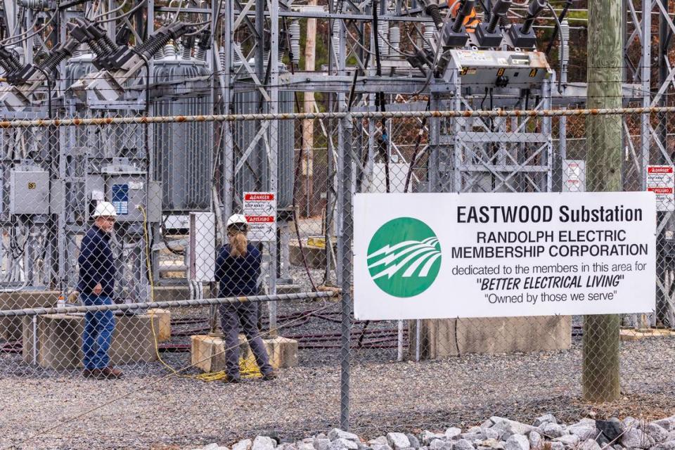 Workers with Randolph Electric Membership Corporation work to repair the Eastwood Substation in West End Tuesday, Dec. 6, 2022. Two deliberate attacks on electrical substations in Moore County Saturday evening caused days-long power outages for tens of thousands of customers.