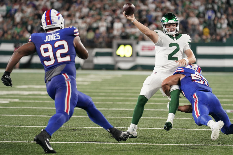 Buffalo Bills defensive tackle Eli Ankou (51) hits New York Jets quarterback Zach Wilson (2) as he throws during the second quarter of an NFL football game, Monday, Sept. 11, 2023, in East Rutherford, N.J. (AP Photo/Seth Wenig)