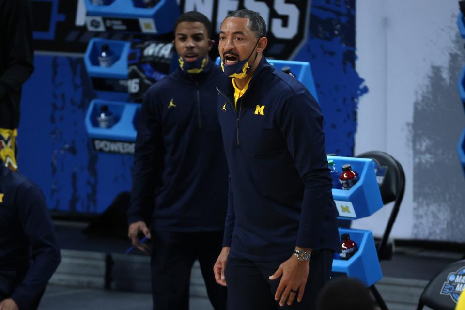 Michigan Wolverines head coach Juwan Howard reacts in the first half against the Florida State Seminoles during the Sweet 16 of the 2021 NCAA Tournament at Bankers Life Fieldhouse on March 28, 2021.