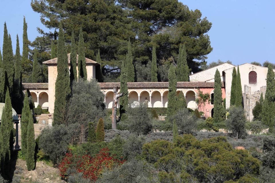 This general view taken on March 29, 2019 from a hill in Auribeau-sur-Siagne shows the Chateau Diter, an illegally-built 57-million-euro ($64 million) Tuscan-style palatial property in Grasse, that has been ordered demolished in a long-running judicial battle between a French property developer and his multi-millionaire British neighbours. - The property named after its owner and builder, Frenchman Patrick Diter, overlooks Grasse, near the French Riviera, and comprises some 3,000 square metres (32,000 square feet) of marbled rooms, giant fireplaces, and antique columns imported from Italy. An appeals court in the city of Aix-en-Provence on March 25 confirmed the order that many of the buildings constructed since 2005 be destroyed within 18 months. Failure to comply so will result in fines of 500 euros a day. Diter was also ordered to pay his neighbours 450,000 euros in damages, but an earlier imposed six-month suspended jail sentence was waived on appeal. (Photo by Valery HACHE / AFP)        (Photo credit should read VALERY HACHE/AFP via Getty Images)