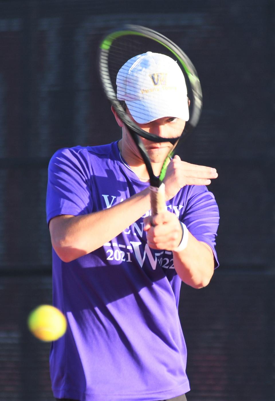 Wylie's Trevor Short hits a ball in the opening match of the Region I-5A tennis tournament Monday at the McLeod Tennis Center in Lubbock.