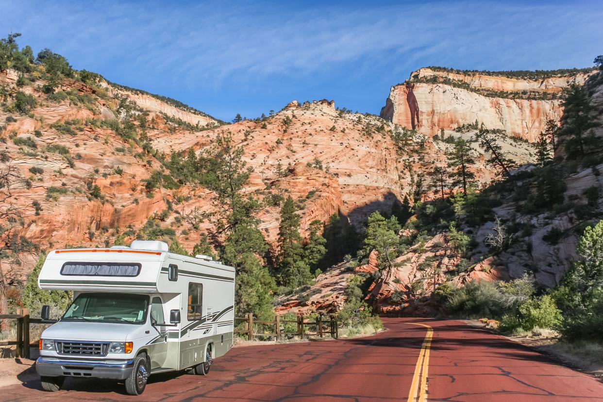 RV Along a Road Through Zion National Park, Utah with mountains in the background
