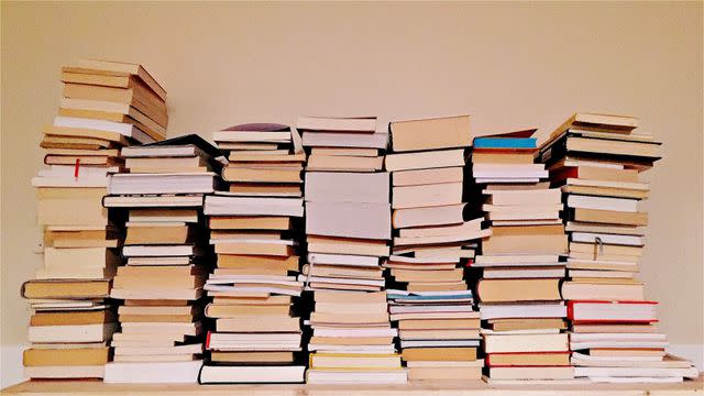 Dario Paini / EyeEm Stacks of books against wall