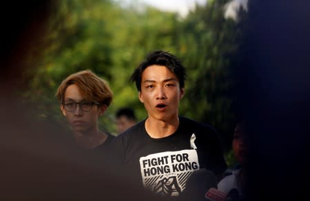 Members of Civil Human Rights Front Jimmy Sham speaks at a news conference in response to the announcement by Hong Kong Chief Executive Carrie Lam regarding the proposed extradition bill, outside the Legislative Council building in Hong Kong