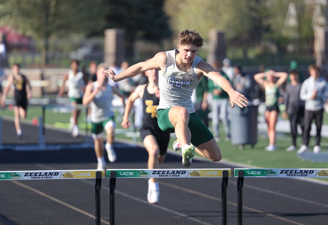 The Zeeland East and Zeeland West boys and girls track and field teams faced off on Tuesday, April 25, 2024, at Zeeland Stadium.