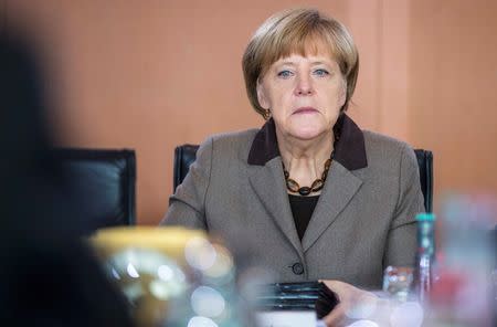 German Chancellor Angela Merkel attends a cabinet meeting at the Chancellery in Berlin October 29, 2014. REUTERS/Hannibal Hanschke