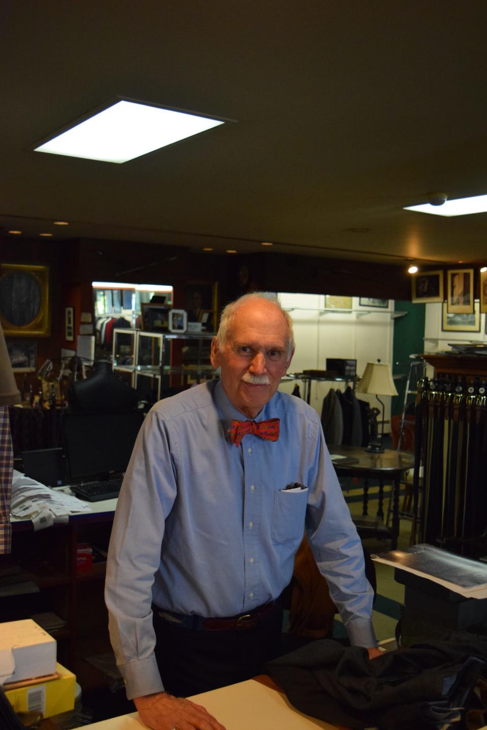 Jim Hunter, owner of Hunter and Coggins, standing at the customer counter at Hunter and Coggins, Sept. 19, 2023.