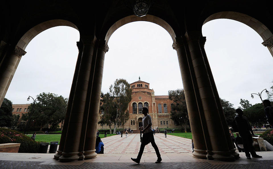 A person walking on a college campus