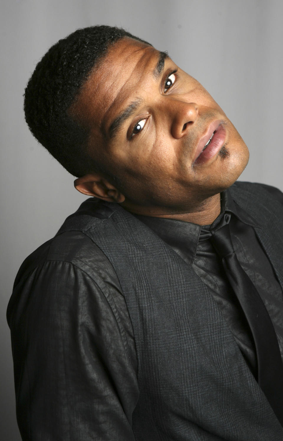 FILE - In this Sept. 18, 2008 file photo, singer Maxwell poses for a portrait in New York. The soul crooner says his new album “blackSUMMERS'night,” due out in 2012, will be a little more upbeat compared to his previous efforts. (AP Photo/Seth Wenig, File)