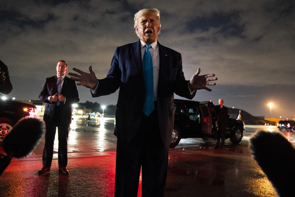 President Donald Trump talks with reporters at Andrews Air Force Base after attending a campaign rally in Latrobe, Pa., Thursday, Sept. 3, 2020, at Andrews Air Force Base, Md. (AP Photo/Evan Vucci)