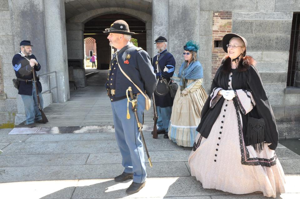 Civil War reenactors from the 2nd Delaware Volunteer Infantry welcome visitors at the entrance to Fort Delaware on May 5, 2023.