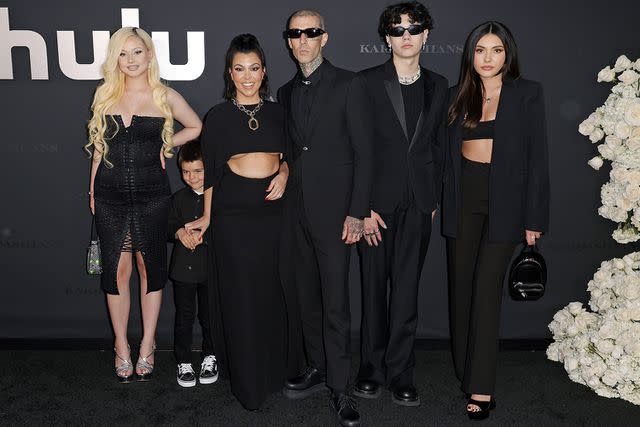 Frazer Harrison/Getty Travis Barker photographed with his kids Atiana, Alabama and Landon, along with wife Kourtney Kardashian.