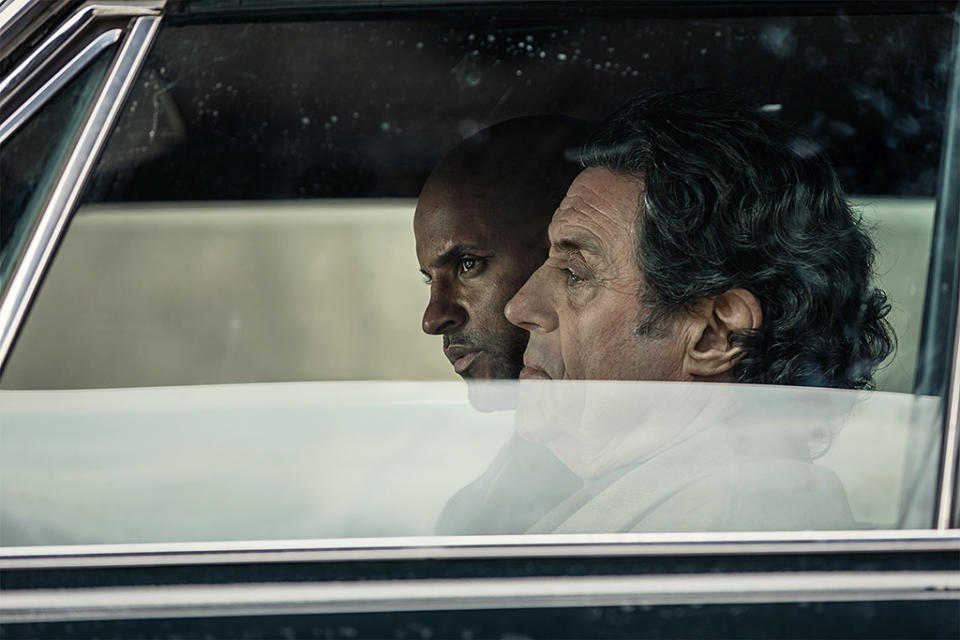 <p>Ian McShane as Mr. Wednesday and Ricky Whittle as Shadow Moon in Starz’s <i>American Gods</i>.<br><br>(Photo: Starz) </p>