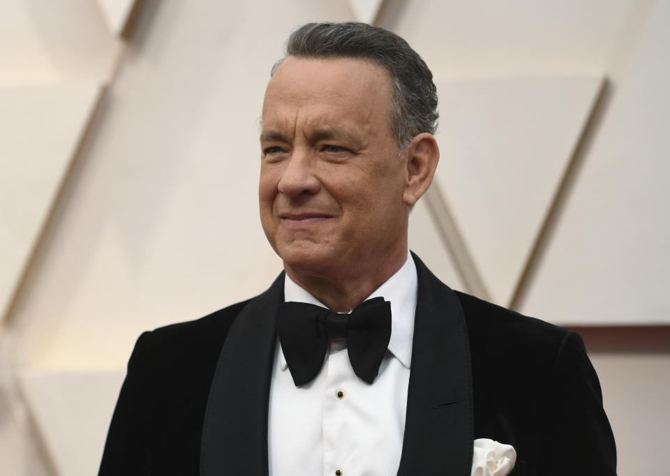 FILE In this Feb. 9, 2020 file photo Tom Hanks arrives at the Oscars at the Dolby Theatre in Los Angeles. The actor delivered a surprise virtual speech Saturday, May 2 to performing arts graduates of Wright State University in Dayton, Ohio. (Photo by Richard Shotwell/Invision/AP)